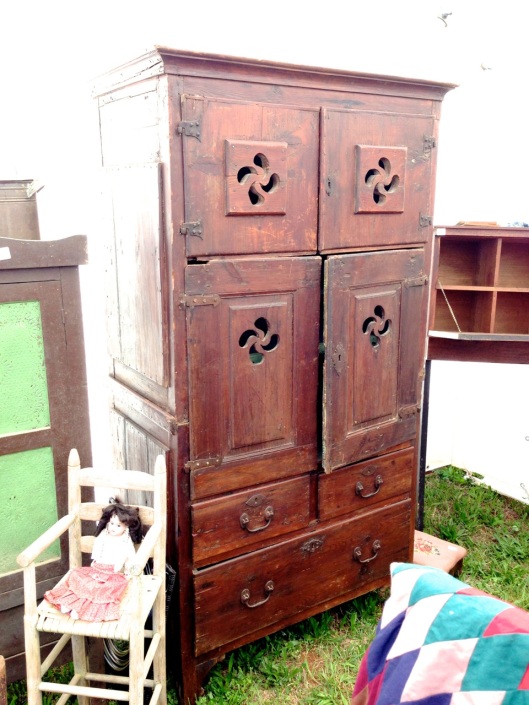 Interesting old cabinet. Hinges don't seem to come from a factory.